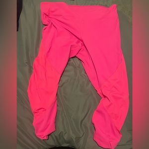Hot pink Fabletics leggings with scrunched bottoms